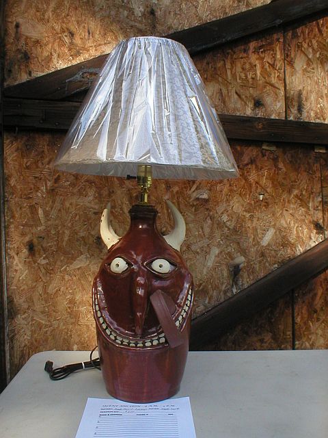 Silent auction Devil jug lamp by Matt